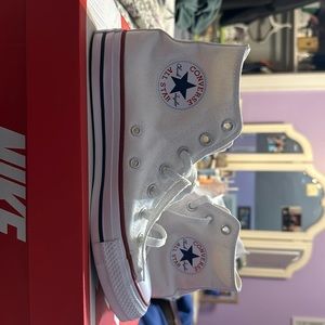Women’s size 7.5 white high top converse